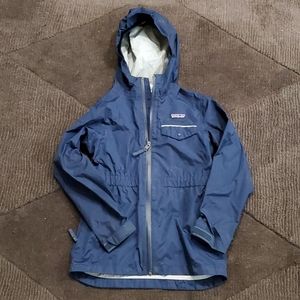 Blue Patagonia raincoat